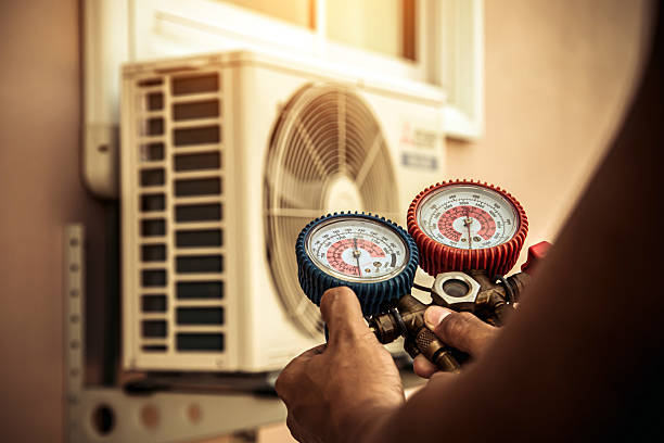 Professional Air Conditioning Service technician working in Dover, DE
